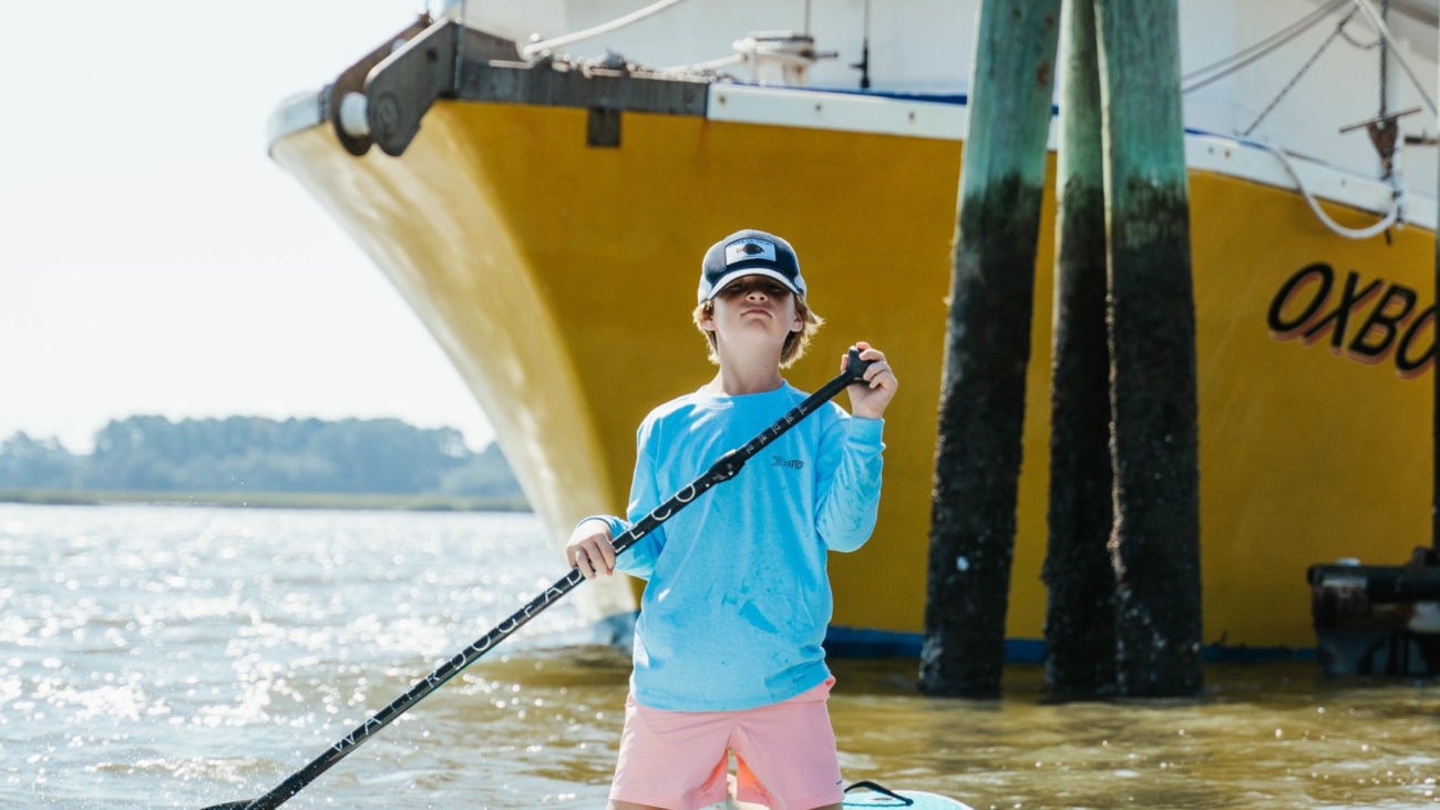 Child paddleboarding