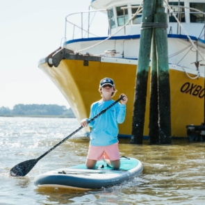 Child paddleboarding