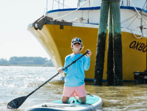 Child paddleboarding